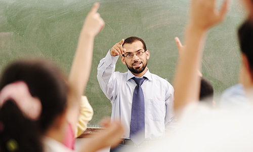 arabic kids in the school, classroom wit a teacher arabic kids in the school, classroom wit a teacher